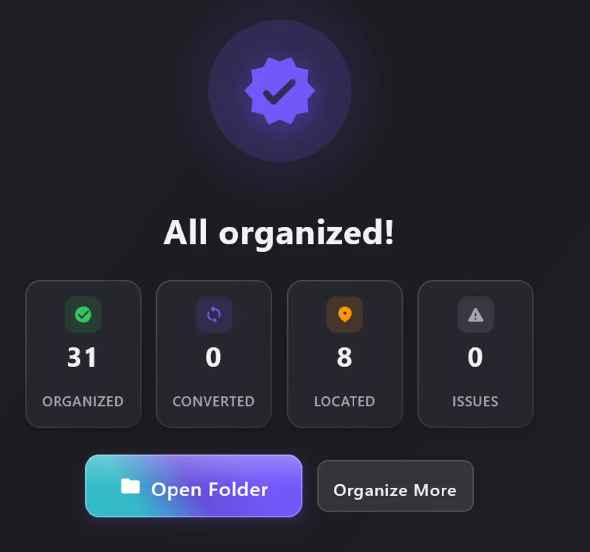 A finished run: 31 organized, 0 converted, 8 located, 0 issues, with a button to open the folder.